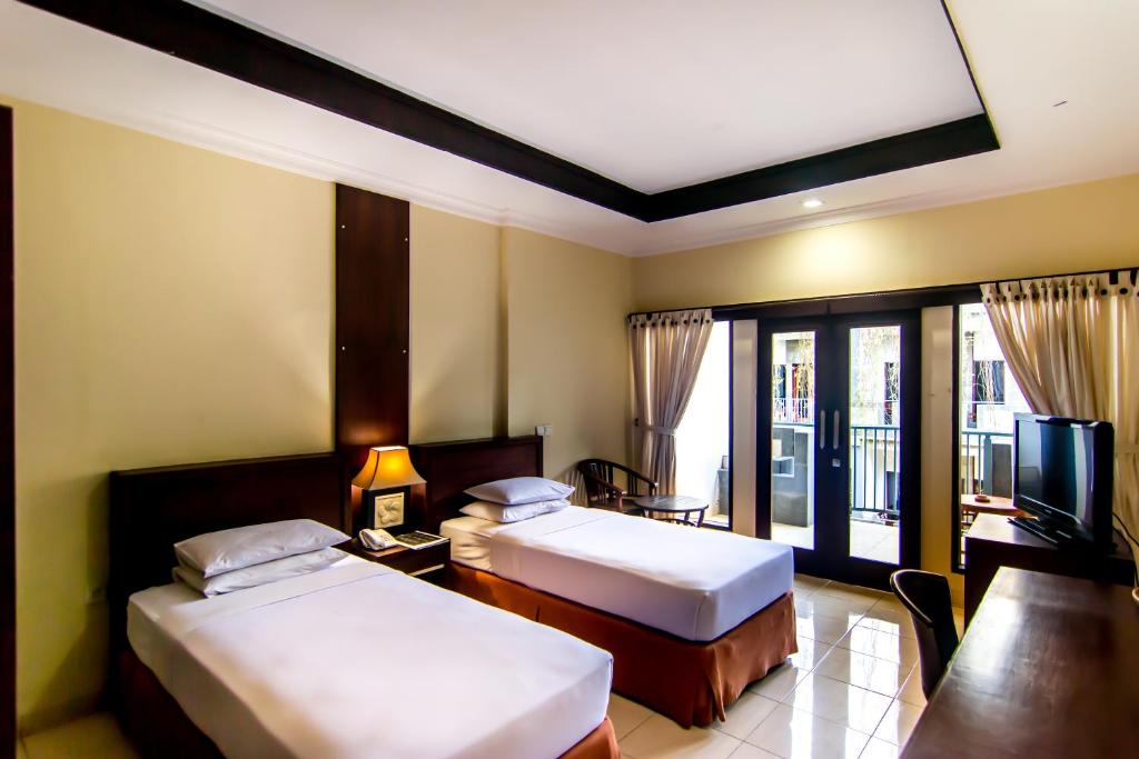 Champlung Mas Hotel — фото 4